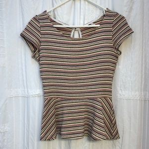Multicolored peplum top.  Made in the USA